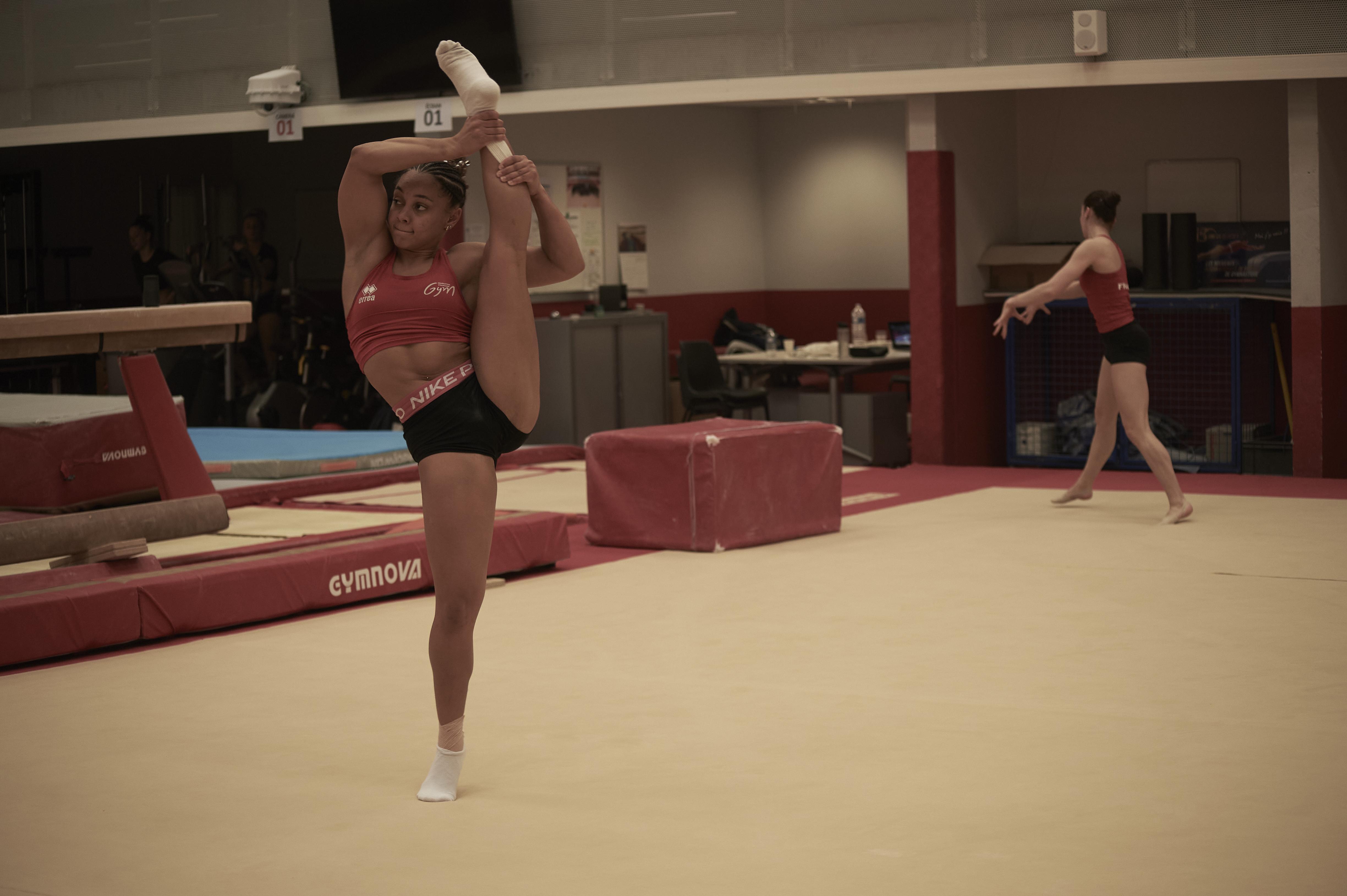 Gymnast in standing splits