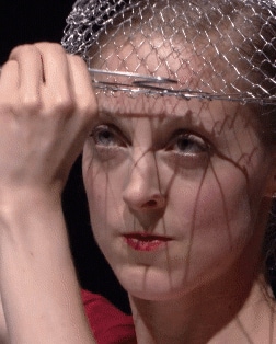 Ruth Child playing with the strainer on her head