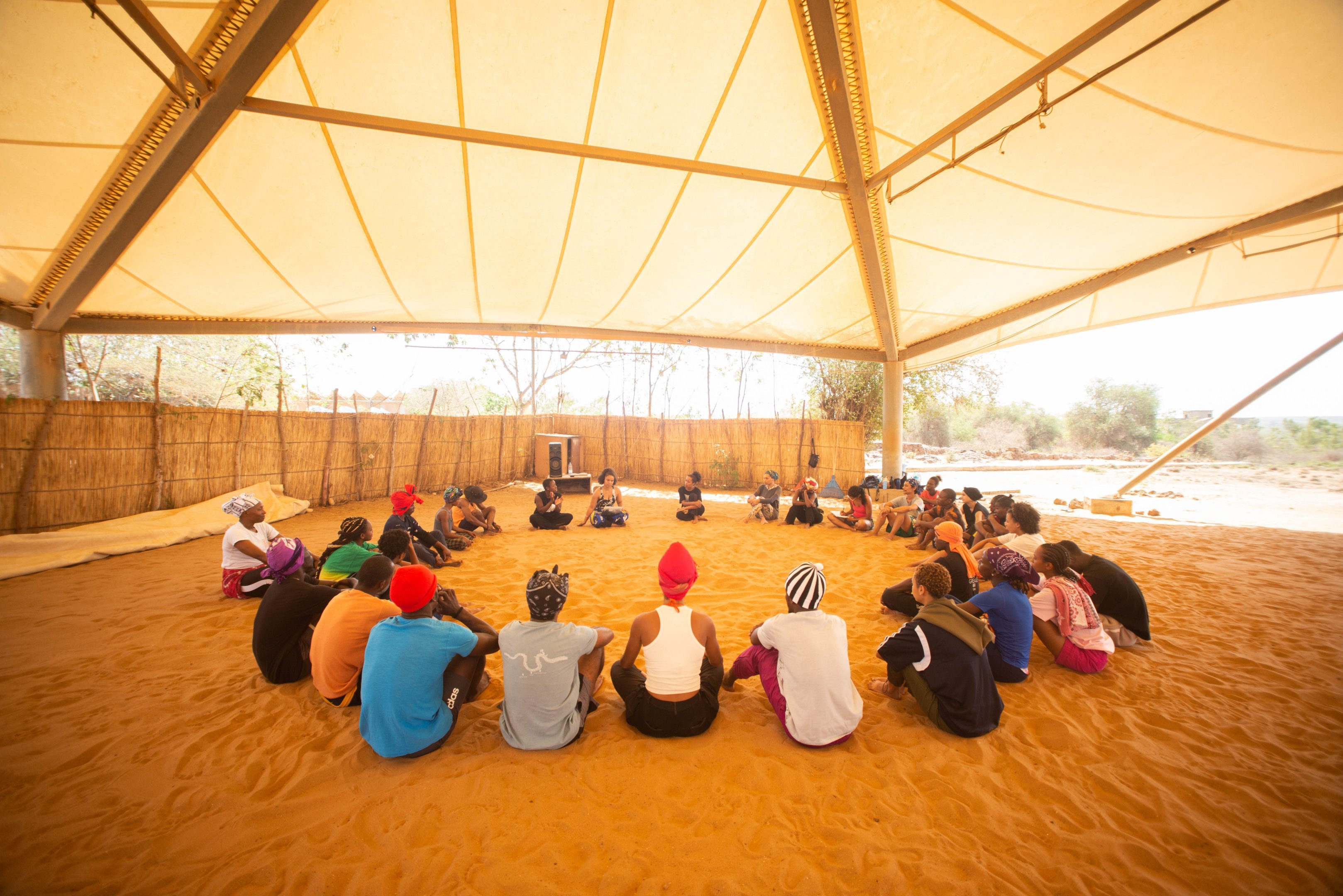 students sitting in a circle 