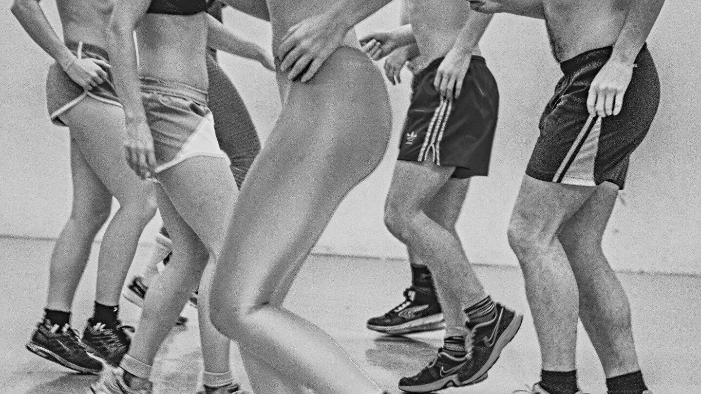 Dancers in sneakers training.