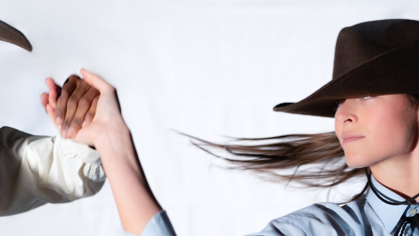 Dancers dressed as cowboys