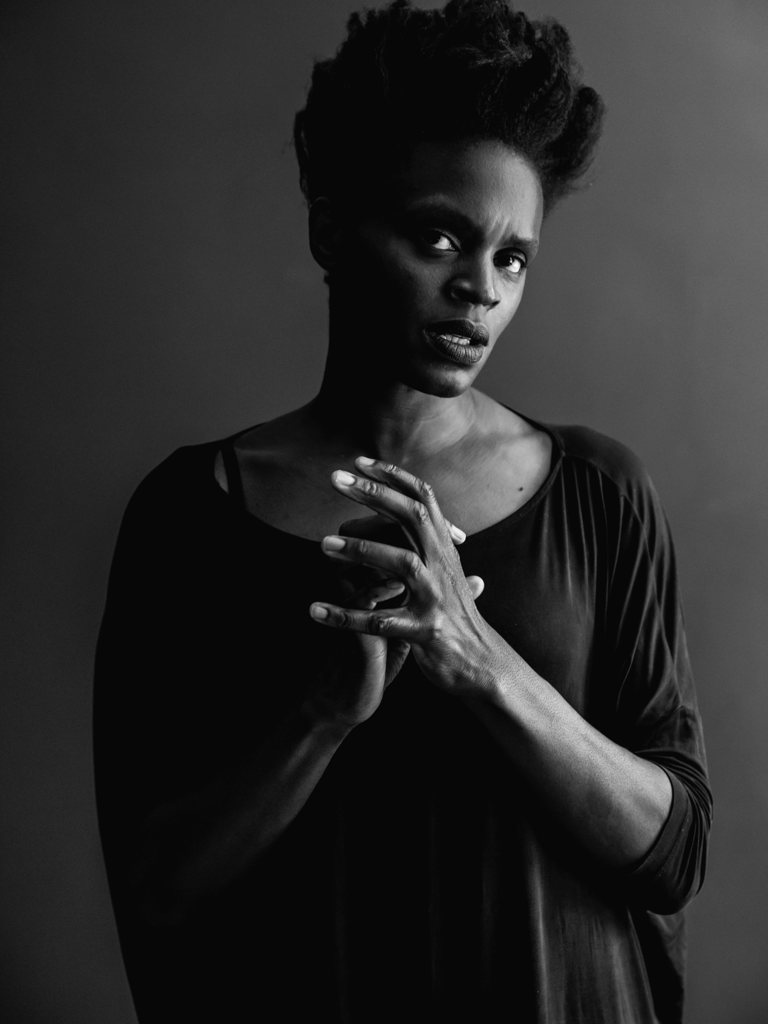 Black and white headshot of Okwui Okpokwasili